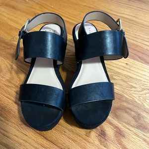 A new day black target shoes worn once